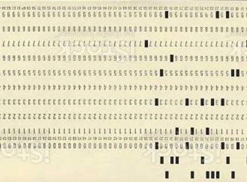 Old computer data entry punch cards.